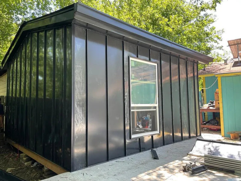 Black standing seam metal wall panels for Roof Inspection in Whitewater