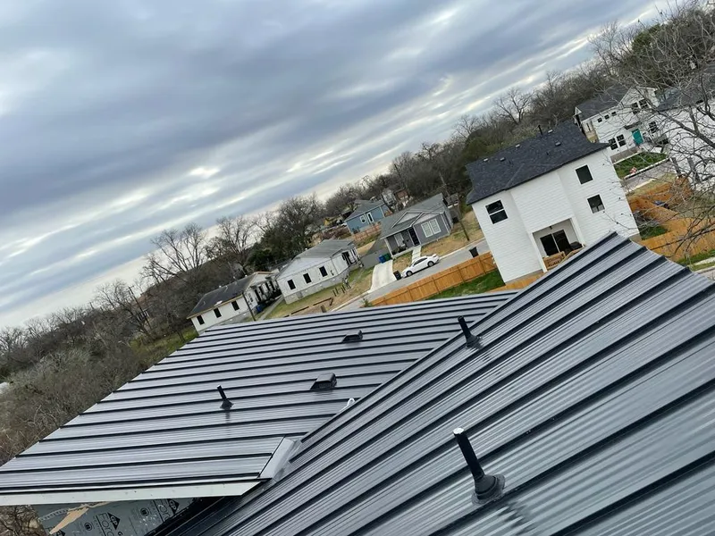 Standing seam metal roof panels with vents for Skylight Repair in Whitewater